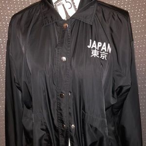 Black windbreaker